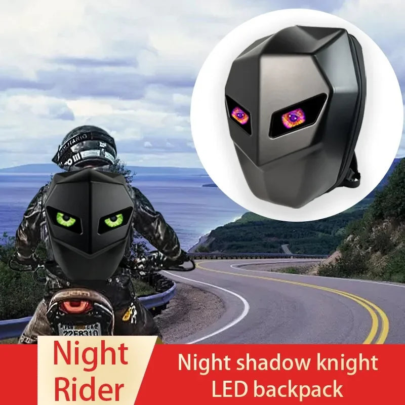 A motorcyclist navigates a winding road, showcasing the stylish LED Hardshell Motorcycle Backpack by HeadphoneHeat, designed to resemble a helmet with glowing eyes. A close-up reveals its sturdy ABS construction. The text reads: "Night Rider" and "HeadphoneHeat Night Shadow Knight LED Backpack.