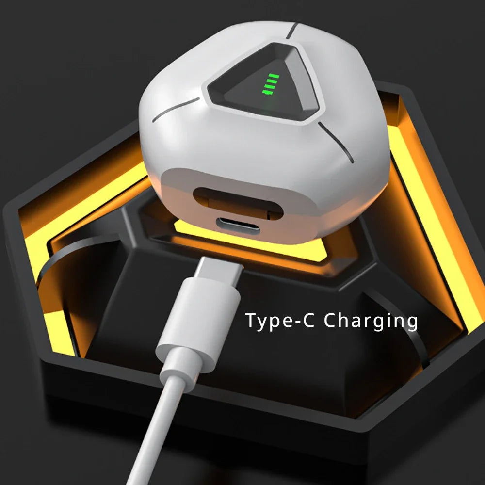 A white, triangular gadget, identified as the HeadphoneHeat Esports ZIXZEX Game Bluetooth TWS Earbuds, is displayed on a black and yellow stand. It is being charged via a USB Type-C cable, with a green LED light indicating charging status. The text "Type-C Charging" is visible near the bottom right corner.