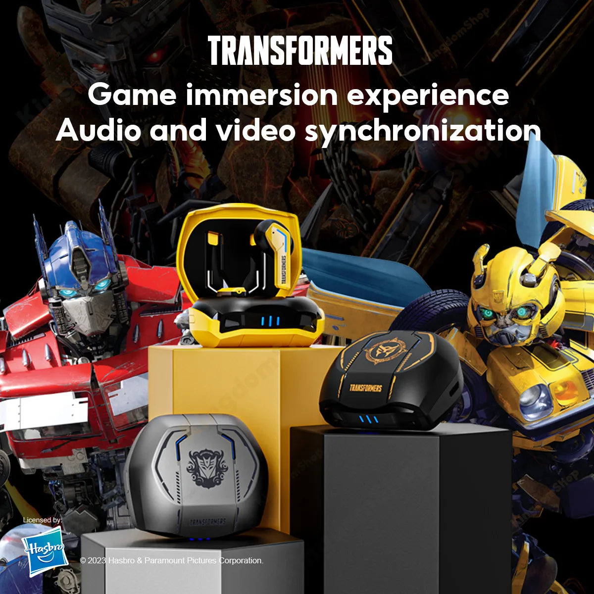 Two Transformers characters, Optimus Prime and Bumblebee, are positioned on either side of display stands showcasing the HeadphoneHeat TRANSFORMERS TF-T06 TWS Bluetooth Gaming Earbuds. Text above reads: "Transformers: Game immersion experience. Audio and video synchronization with Bluetooth 5.3.