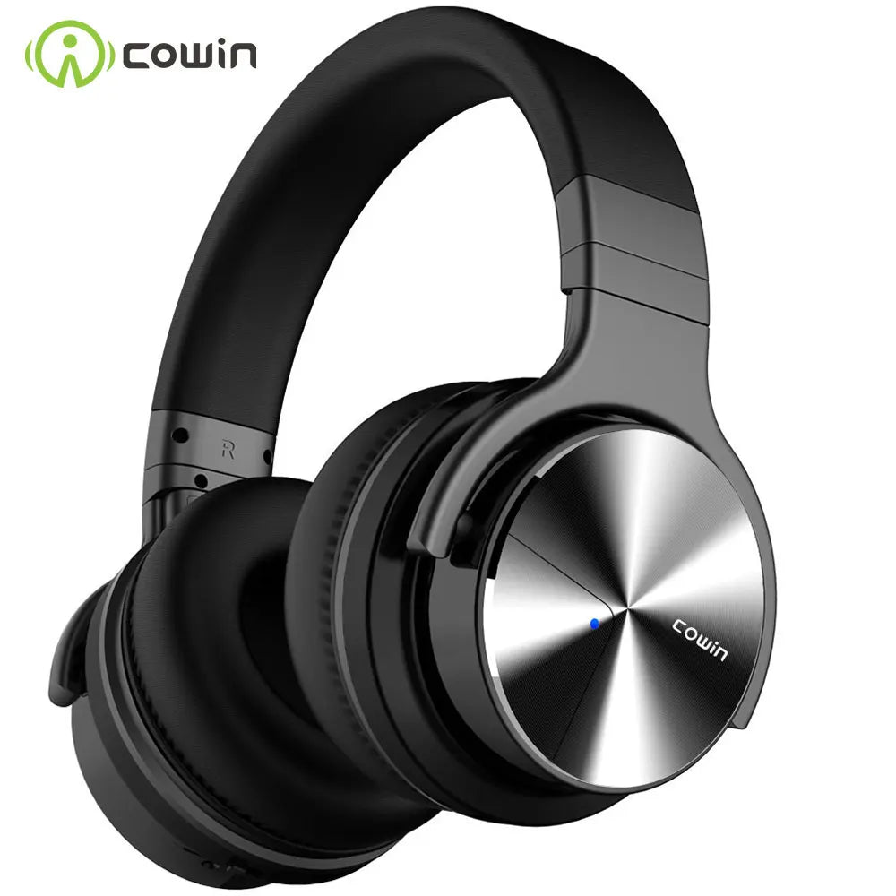 An image of HeadphoneHeat's Cowin E7Pro Active Noise Cancelling Bluetooth Headphones in black, showcasing a sleek and modern design. The ear cups feature a metallic finish with the Cowin logo prominently displayed on one side. These over-ear headphones offer wireless connectivity, a cushioned headband and ear pads for optimal comfort, and advanced active noise-cancellation technology.