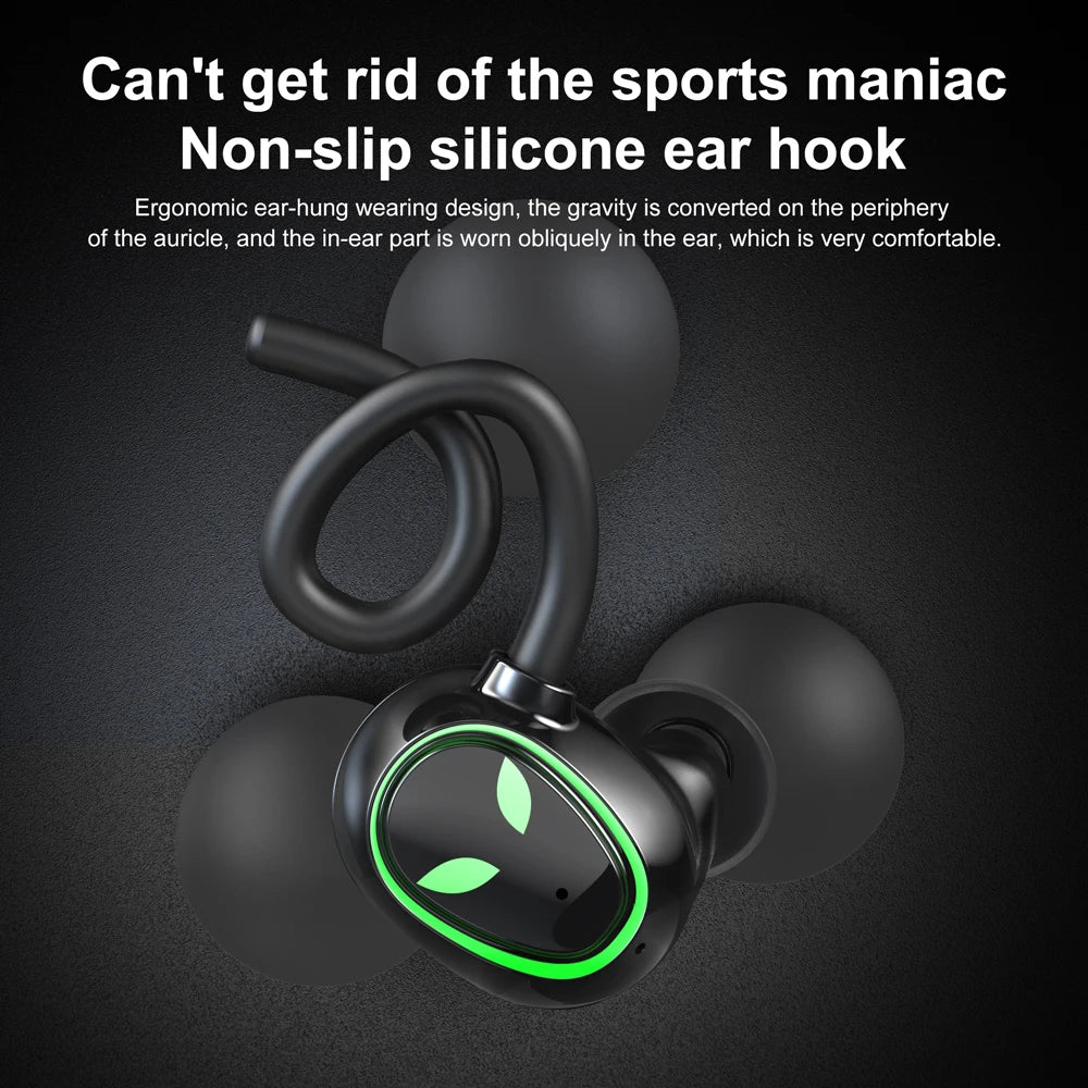 HeadphoneHeat's TWS Newmsnr UFO Halloween Earbuds, in sleek black with green LED accents and non-slip silicone ear hooks, are showcased against a textured dark background. Utilizing Bluetooth 5.1 technology, the description underscores their ergonomic design and comfort, highlighting a secure fit ideal for sports activities.