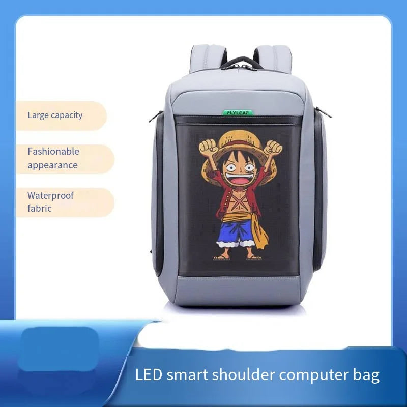 Introducing the Flashback Backpack with HD Display by HeadphoneHeat: a stylish gray computer bag with an LED screen that showcases an animated character wearing a straw hat, blue shorts, and a red vest. This backpack features multiple interior compartments, durable polyester fabric, a large capacity, and a fashionable waterproof design. The labels read "Hakeai" and "LED smart shoulder computer bag.