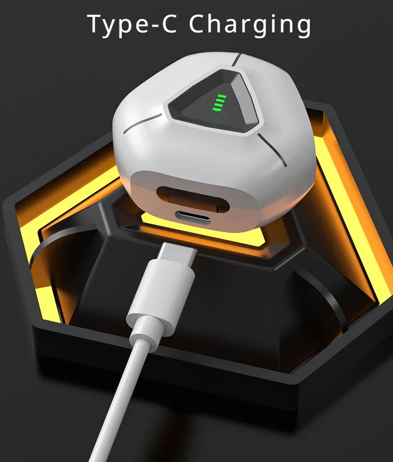 An image of the Esports ZIXZEX Game Bluetooth TWS Earbuds from HeadphoneHeat, featuring a modern, hexagonal design. A white charging cable is connected to the earbuds' case, which is situated on a dark, stylized base with yellow accents. The case showcases a green indicator light, signifying charging status.